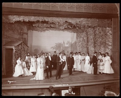 A Scene from an Amateur Production of a Play Titled School by Byron Company